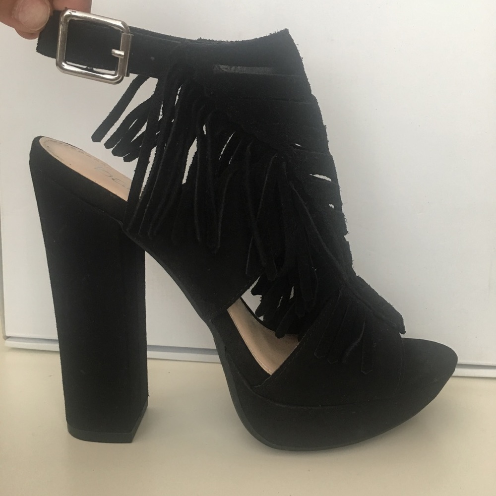 Black platform peep toe heels with fringe